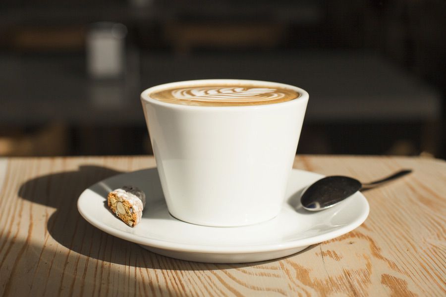 close-up-coffee-cup-spoon-desk edit