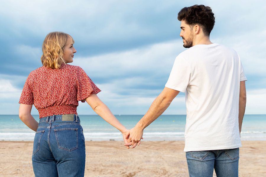 UPDATED good back-view-of-a-cute-young-spanish-couple-holding-h-2023-11-27-05-15-01-utc-copy copy