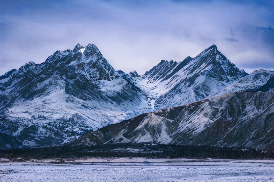 A beautiful scenery of rocky high mountains in Gongga County, Tibet, China